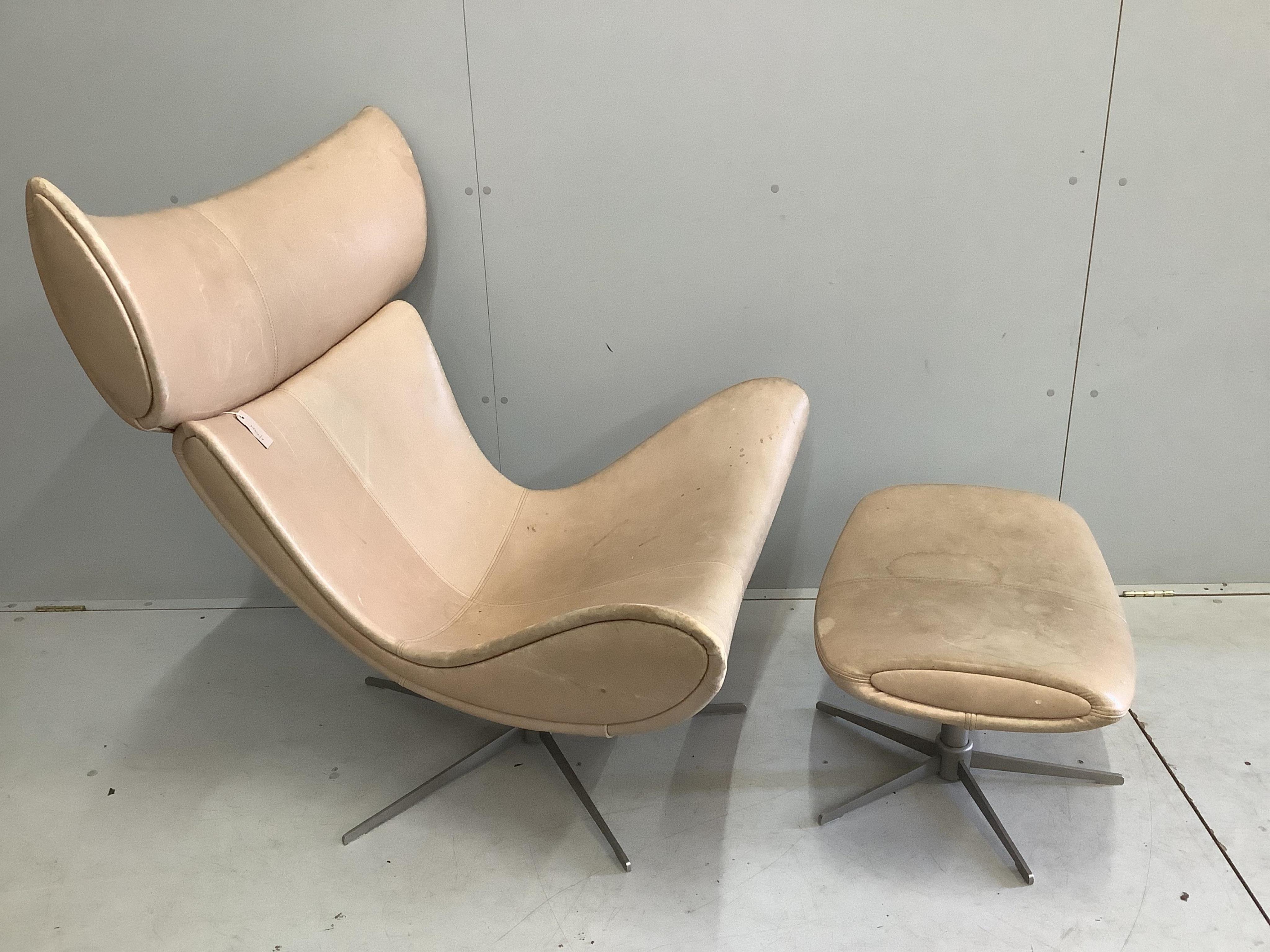 A Bo Concept Imola natural leather swivel chair, width 93cm, depth 90cm, height 110cm and footstool